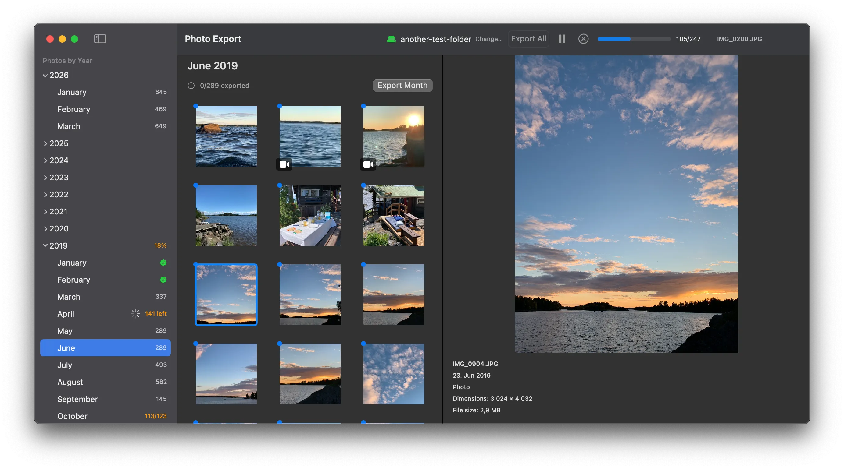 Photo Export app showing the year/month sidebar, thumbnail grid, and full-size photo preview